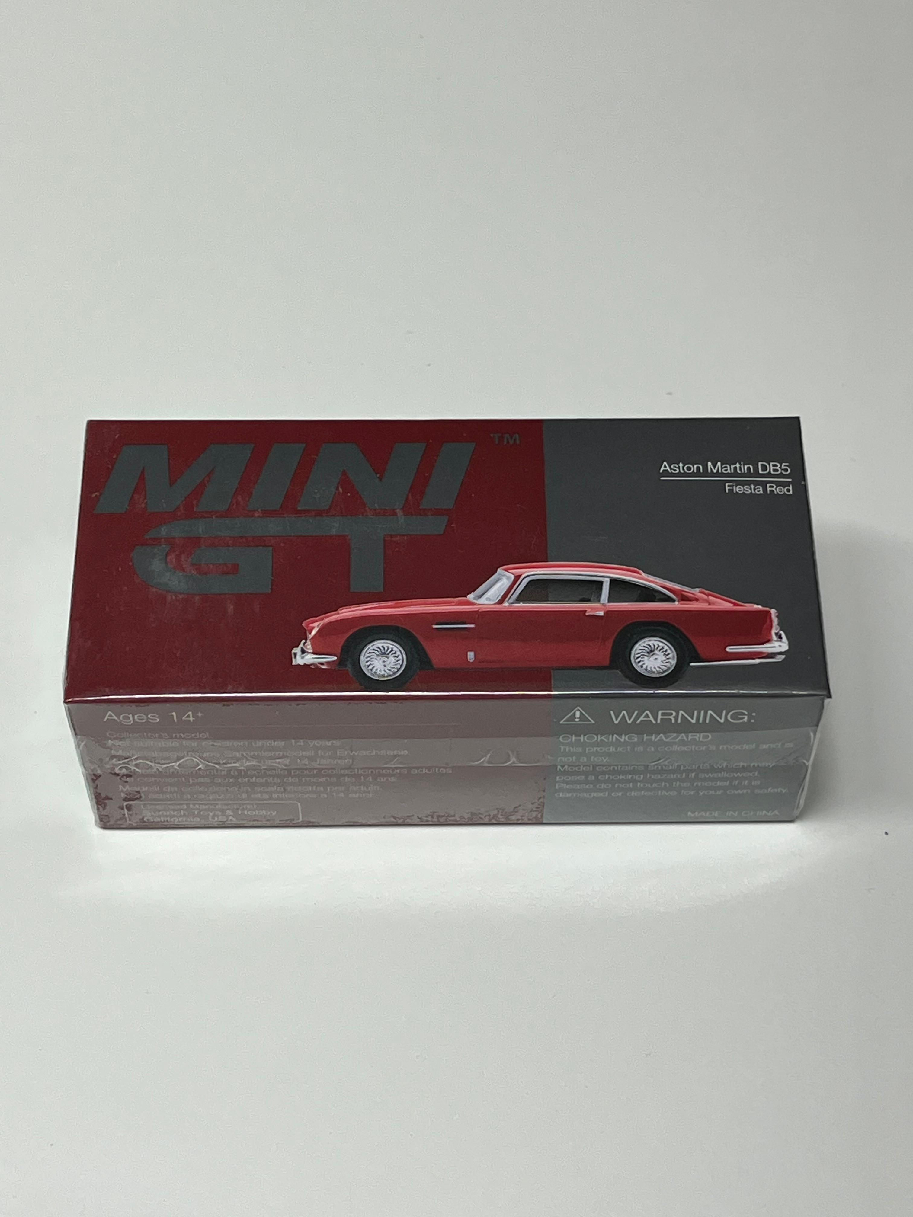 Mini GT #1305: Aston Martin DB5 Fiesta Red: Actual unit · Front 4